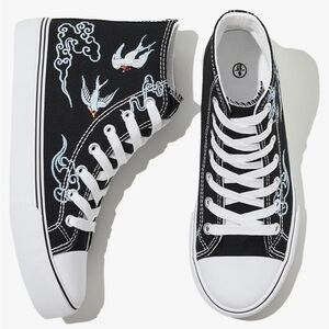 Black canvas high tops embroidered with blue birds, swallows, and clouds size 7